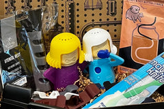 A subscription box full of different kitchen gadgets that are used for cooking, meal prep, or clean up.