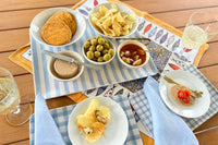 Indulge in the Seafood & Crunch Tapas Delight Box, featuring mussels paired with gourmet potato chips, anchovies pate over tomato crackers.