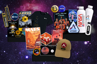 Open space subscription box displaying astronomy-themed gifts, cosmic collectibles, accessories, and educational items.