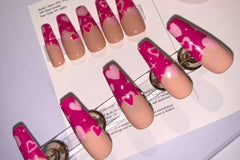 Valentines Day set. French tip design with nude base and hot pink and light pink hearts of different shapes and stars