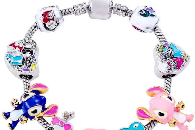 Lilo and Stitch vintage silver charm bracelet with colorful character charms and a heart charm on a clean white background.