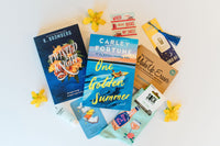 Box of Books subscription box featuring "One Golden Summer" by Carley Fortune and "Twisted Hate" by K. Bromberg with extra items