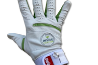 Inside The Leather Brand golf glove. Features wrap around wrist reinforcement, built in tee and green marker holders. 