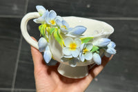 Hand Sculpted Floral Ceramic Art，a one of a kind coffee mug or a handcrafted tea cup.Enjoy with afternoon reading or during teatime.