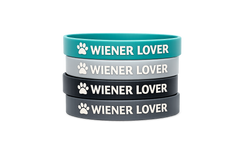 Example Cult of Wiener subscription box showing sample wiener themed items. Boxes ship monthly, with rotating themes each month.