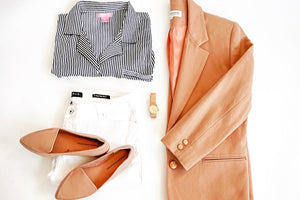 a camel colored wool blazer, matching loafers, white denim and a striped button down shirt with gold accessories to match