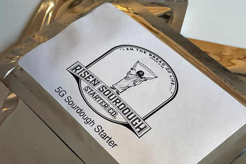 This shows Risen Sourdough Starter packaged in a mylar bag to protect it! packaging may vary , has a black and white label with the Messiah!