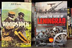 Two books from our History book section: Woodstock and Ending the Siege of Leningrad, valued at over $50 retail.
