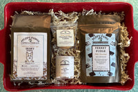 Box includes: 
one full-size  12oz bag of coffee , 
a themed lagniappe gift for the human 
and a sample treat for your furry friend