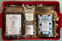 Box includes: 
one full-size  12oz bag of coffee , 
a themed lagniappe gift for the human 
and a sample treat for your furry friend