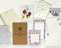 Box Overview / Flat Lay items. Custom name notepad from personalized stationery subscription set with themed design