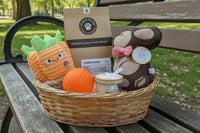 Box includes;
One full size bag dog treats,
One Chew Toy
One Plush/Rope/Ball
One themed gift for the human 
