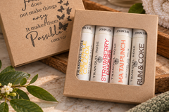 Tranquil Rose Happy Hour lip balm set featuring handcrafted flavor-inspired balms in beautiful, affordable gift-ready packaging.