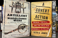 Two hardcover books from our History book section: Artillery of the Napoleonic Wars and A Covert Action.