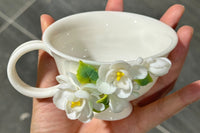 Hand Sculpted Floral Ceramic Art，a one of a kind coffee mug or a handcrafted tea cup.Enjoy with afternoon reading or during teatime.