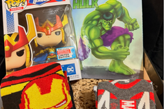 Which Superhero license will you choose DC Funko or Marvel contents including Iron Man, avengers socks and the Hulk book