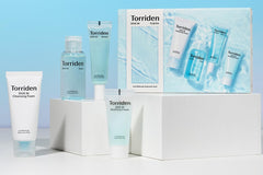 Close up photo of 4 skin care products from a popular brand called Torriden. All with blue and white color scheme.