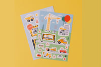 Sticker sheets with a construction theme design. Includes stickers of diggers, dump trucks, cranes and houses. 