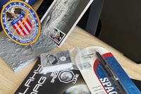 Astronomy subscription box with curated space gifts, cosmic collectibles, educational items, and galaxy-themed accessories.