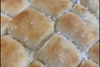 This image shows Parker House Rolls that has been baked using Risen Sourdough Starter Co.'s Starter. We added it to our baked goods !