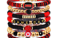 Game Day 8-piece stackable friendship bracelet set in red, black, and gold beaded colors with football-themed charms including a football, a