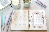 Promise Keeper Christian Journal Planner Subscription Open with Candle, Bible, Cup of Lemon Tea, and Highlighters - Bible Reading Plan