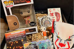 Halloween Variant box including Trick 'R Treat Sam Funko, Pennywise socks, Halloween Fairy Lights and and assortment of Halloween stickers