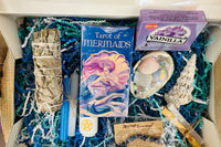 Example of a November 2024 Subscription Box. Every Box Comes with a Tarot Or Oracle deck Along with 5 Metaphysical Mystery Gifts