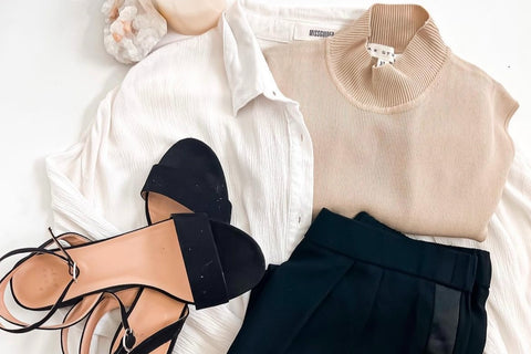 fresh summer fashion outfit with cream silk mock neck sleeveless top, low slung heeled sandals, black plaza pants to match and linen shirt