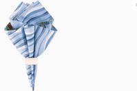 A set of 4 reversible napkins that will add a fun and colorful touch to your dining table.  