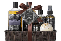 Gift box full of mens products like shampoos, showe gels, bath bombs, and many more in a special basket