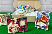 Los Angeles Angels baseball cards, including autographs and relics, arranged in display stands on a green carpet