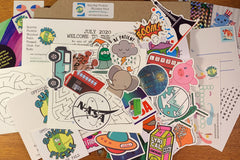 contents of one of the original packs, which shows. stickers, stationery, writing prompts, activity sheets, and more