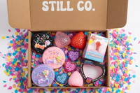 Subscription box for tween girls with squishy toys and other items to hep de-stress. The perfect gift. 