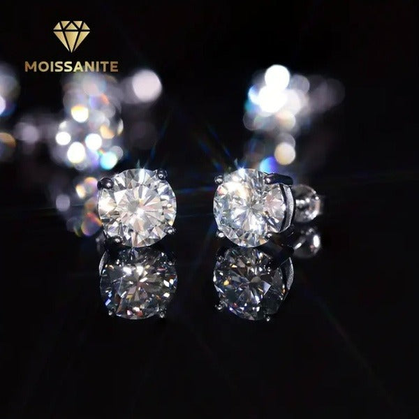The Beauty Gods moissanite stud earrings sparkling on black