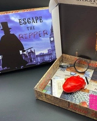 Escape the Ripper escape room game box with a London puzzle board and clues