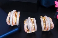 This photo shows three pieces of multi tone 585 14k gold earring set with matching style multi color 14k gold ring.