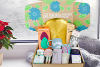 The Balanced Lifestyle Box filled with wellness products, herbal teas, and skincare items, a thoughtful self-care gift box for women