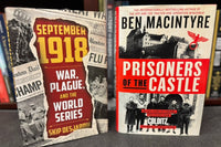 Two hardcover books curated by Bradley's: September 1918 and Prisoners of the Castle, valued at over $50 retail price.