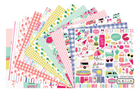 Colorful scrapbook papers and stickers in a monthly scrapbook kit featuring floral designs and cameras, ideal gifts for women