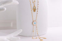 Two piece 18 inch 14k 585 gold evil eye necklace w/pull through clasp and two dangling pendants