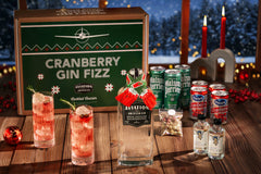 The Aviation Cranberry Gin Fizz with AVIATION AMERICAN GIN, Cranberry Juice, Simple Syrup, Sparkling Water, Lemon, Glitter Dusted Cranberry