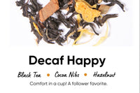 Premium Loose Leaf Tea, Decaf Happy. Text reads Black Tea, Cocoa Nibs, Hazelnut. Cozy comfort in a cup! Decaffeinated black tea. 