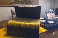 A box of Knit Snail Mail letters readt to be mailed. Letters are sent on the third Thursday of each month.