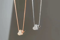 18k rose Gold or 925 silver double heart pendant with 17in rope style chain in matching Rose
goldOr Silver which both comes with 3in extens