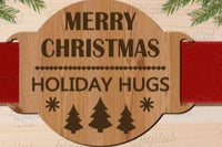 This ribbon ornament was the perfect addition for Christmas gift giving. Pull ribbon thru slots, secure in the back of the package!