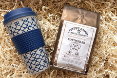 Box includes: 
one full-size  12oz bag of coffee , 
a themed lagniappe gift for the human 
and a sample treat for your furry friend