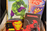 Superhero box includes contents such as Iron Man Socks, Deadpool comic, Hulk book and Vintage greatest Superhero fights DVD