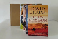 Brown subscription box filled with four surprise fiction books, offering captivating stories and diverse plots for literature lovers.