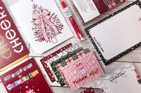 Custom name notepad from personalized stationery subscription box with themed design. Box Overview / Flat Lay